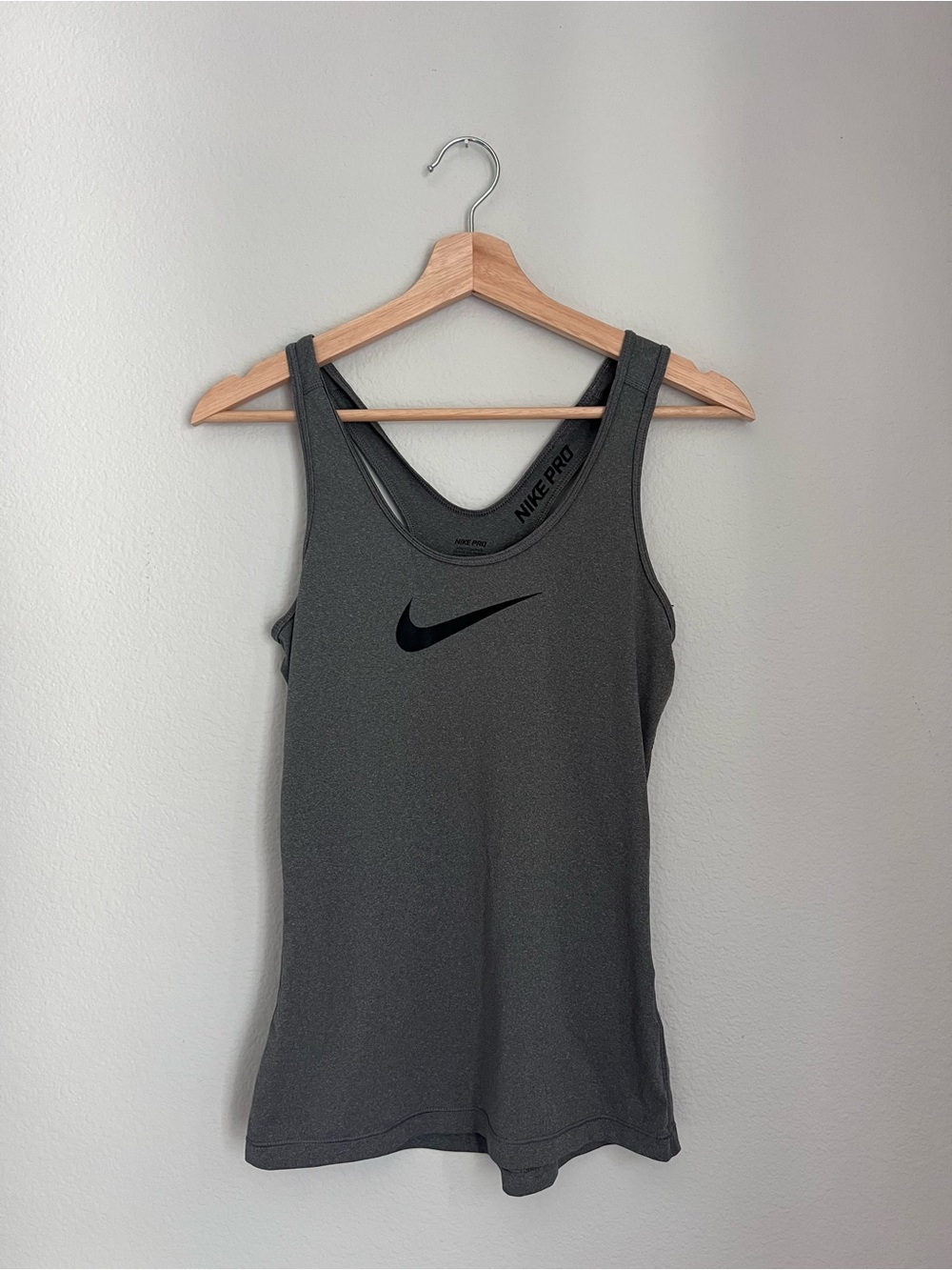 Nike Womenβs Dark Gray Tank Top with Black Swoosh